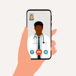 Patient Having Video Call With Black Male Doctor Using Mobile Phone. Telemedicine. Telehealth.